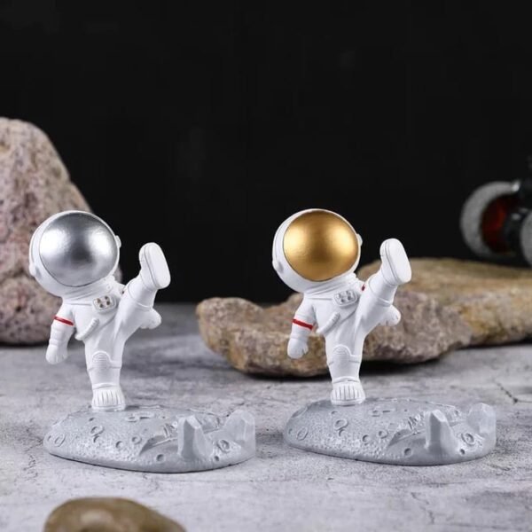 Kicking Astronaut Mobile Phone Stand