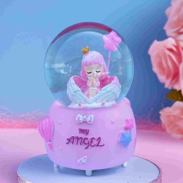 angel christmas snow globe